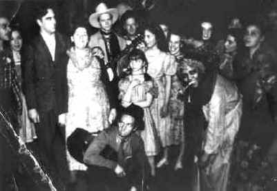Woody Guthrie, Alan Lomax, and others in a group shot